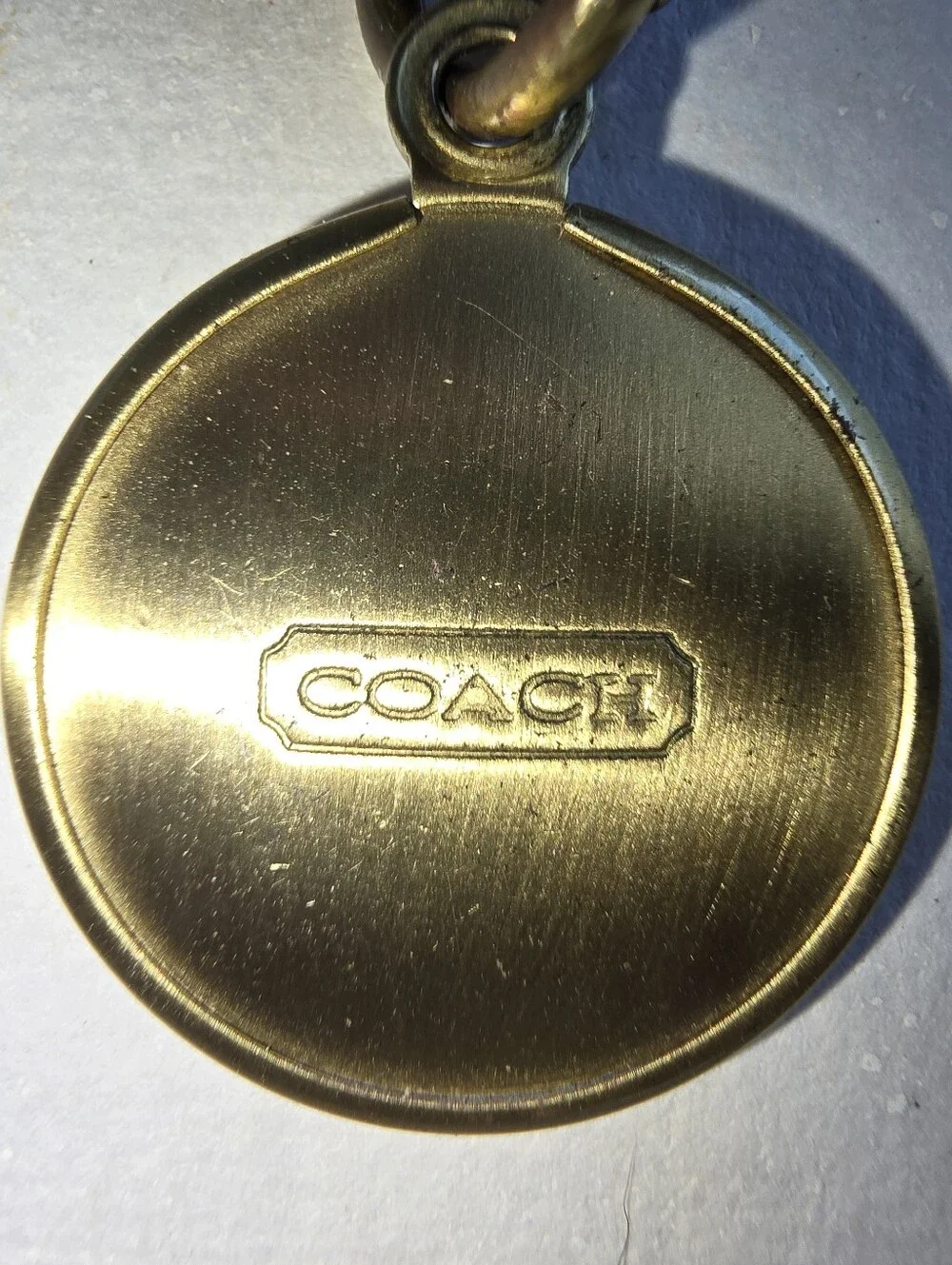 Coach Gold Tone Pendant Est 1941